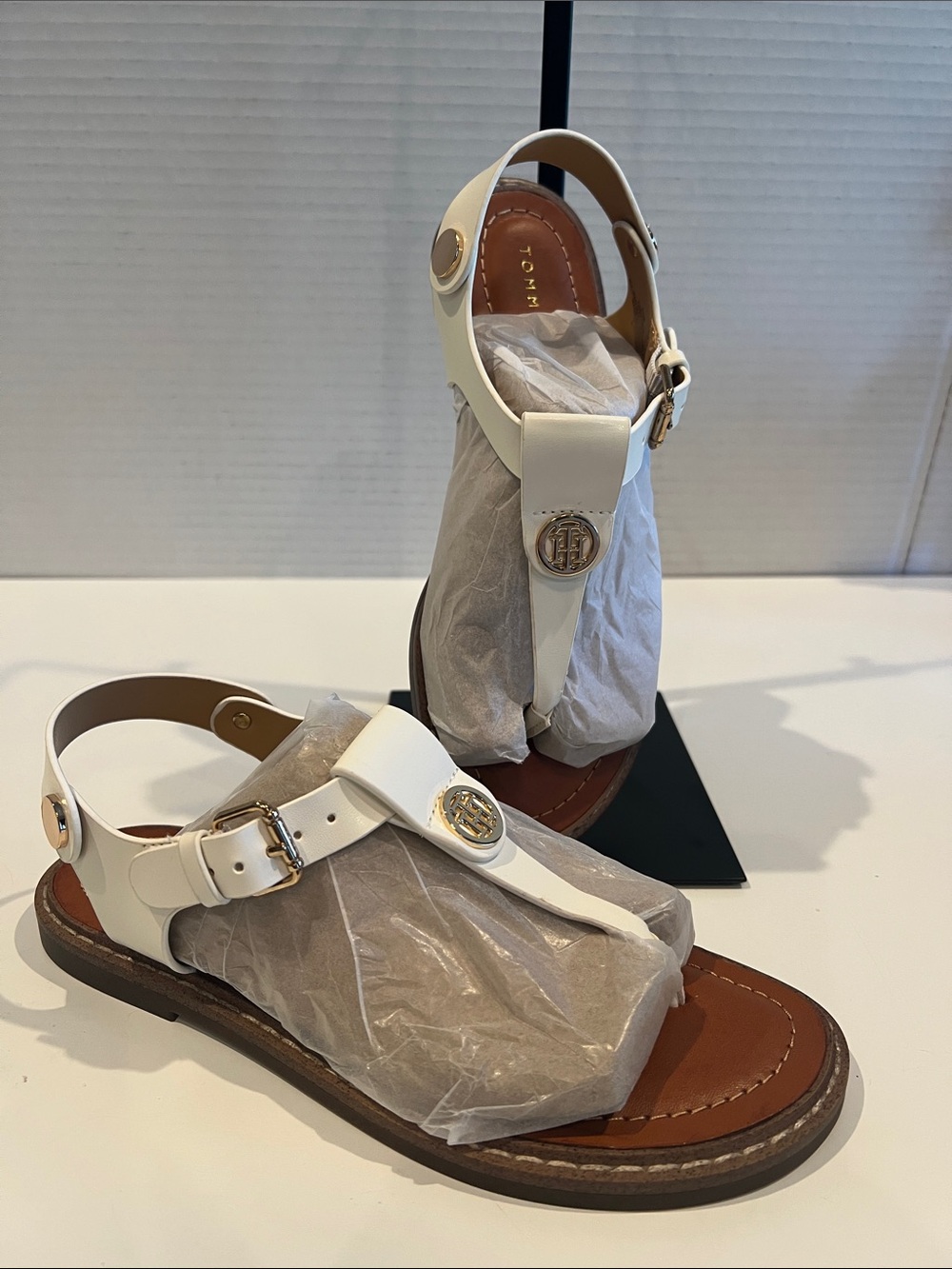 Tommy Hilfiger White T-Strap Sandals with Gold Emblem